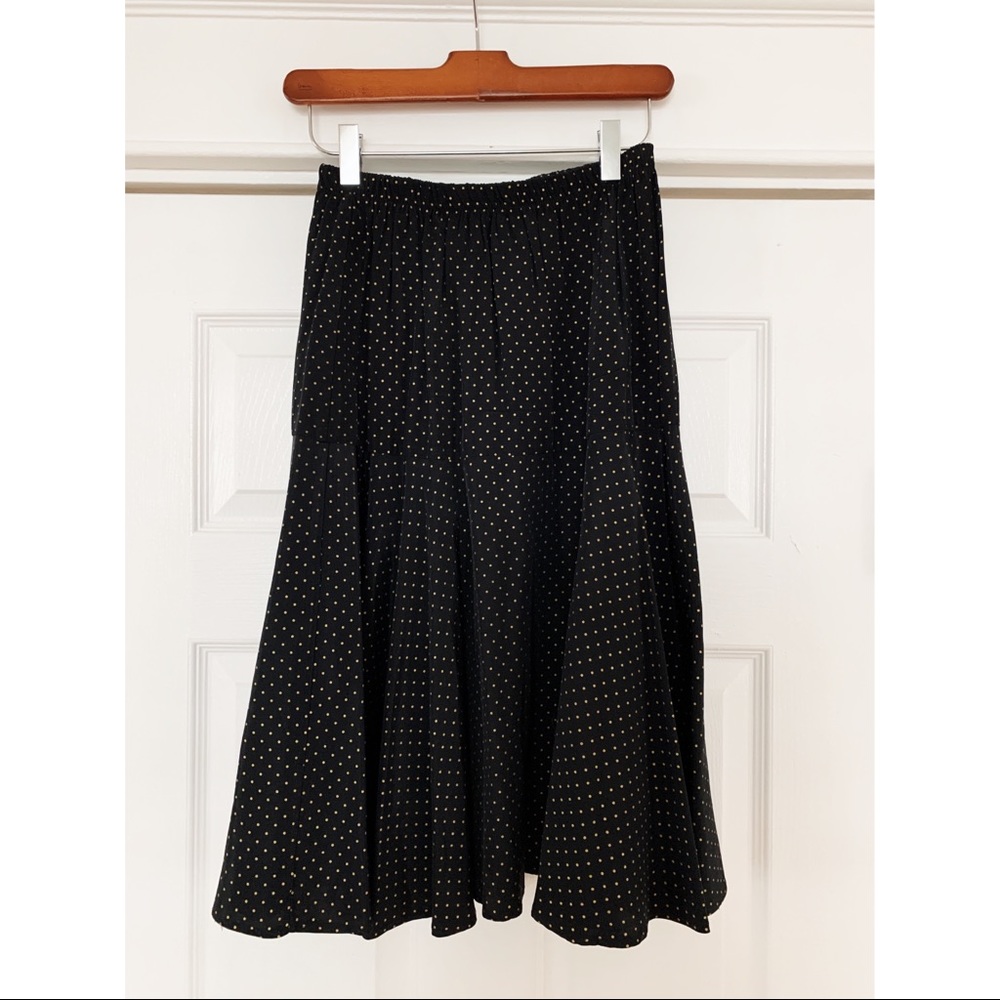 Vintage black skirt with gold polkadots.